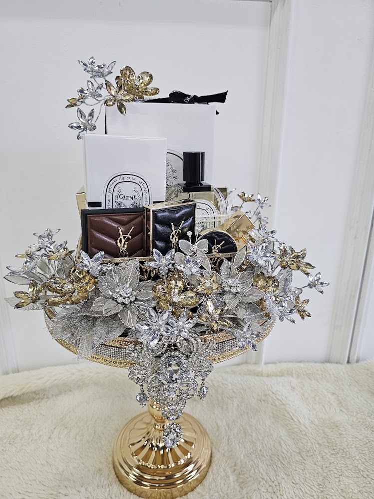 Seri Champagne Pedestal: gold pedestal hantaran with silver and champagne crystal flowers holding fragrance and beauty gifts